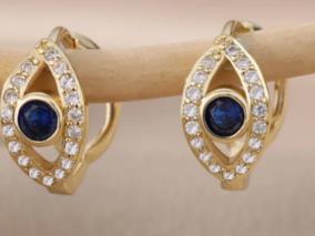 18K Gold button earrings against the evil eye